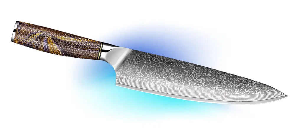 Vue complète du couteau Chef Collector, lame damassée et manche ergonomique alvéolé.