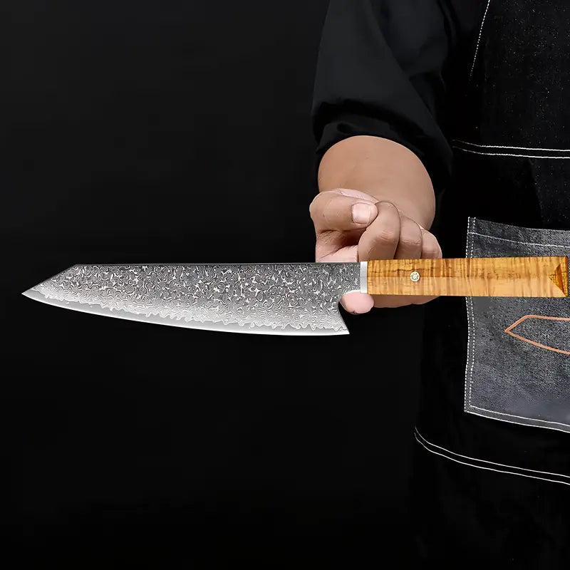 Couteau Kiritsuke Chef du Temple présenté de profil sur fond sombre, lame à motifs ondulés et manche droit.