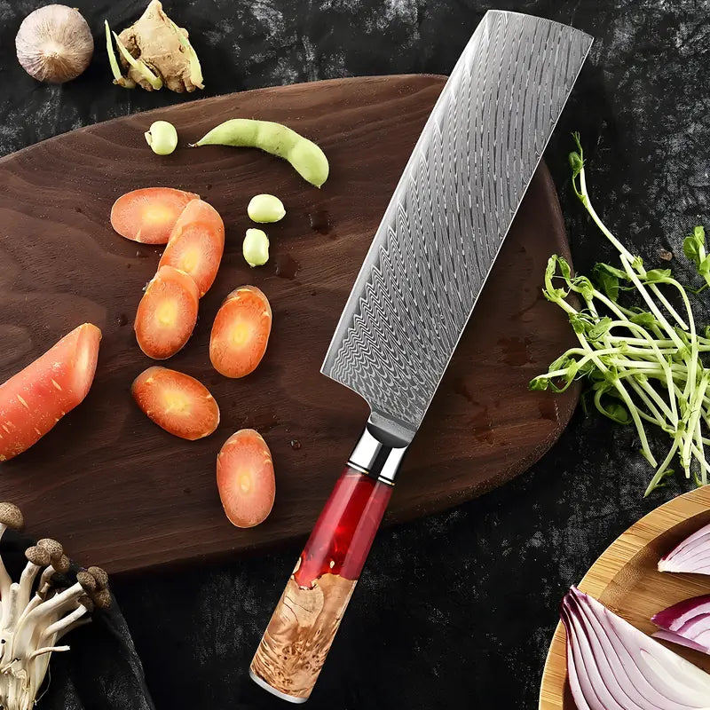 Couteau Nakiri Flamme de Kyoto présenté sur une planche avec des légumes coupés et des herbes fraîches.